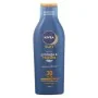 Leche Solar Protege & Hidrata Nivea Protect And Moister SPF 30 (200 ml) Spf 30 200 ml | Epamu | Beauty Shop - Parfums, Make-up & Essentials Epamu.eu